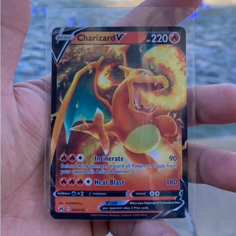 Pokemon Charizard V Card - Orange and Black